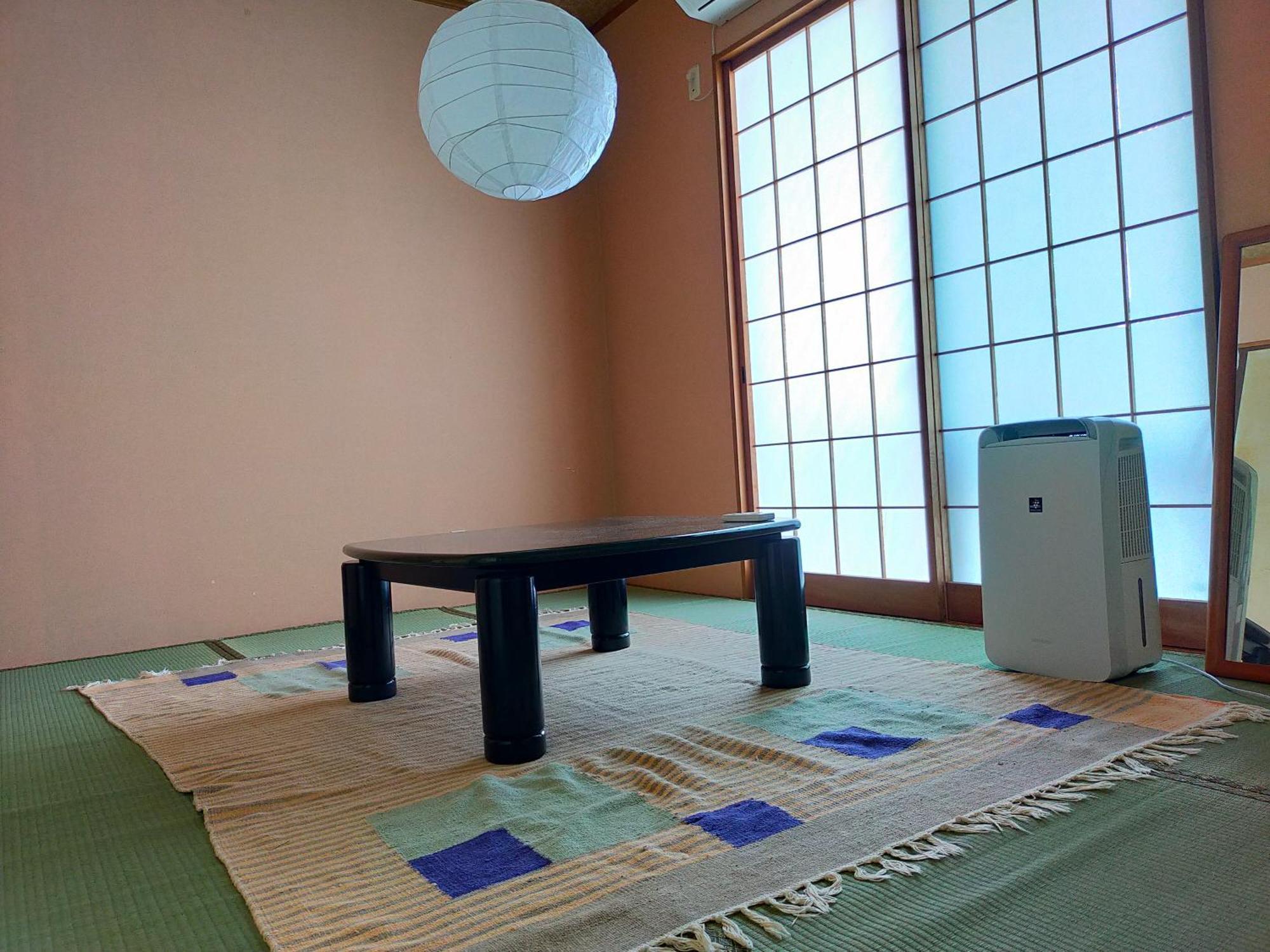 奄美ゲストハウス宇宿サンライズビーチ Amami Exterior foto